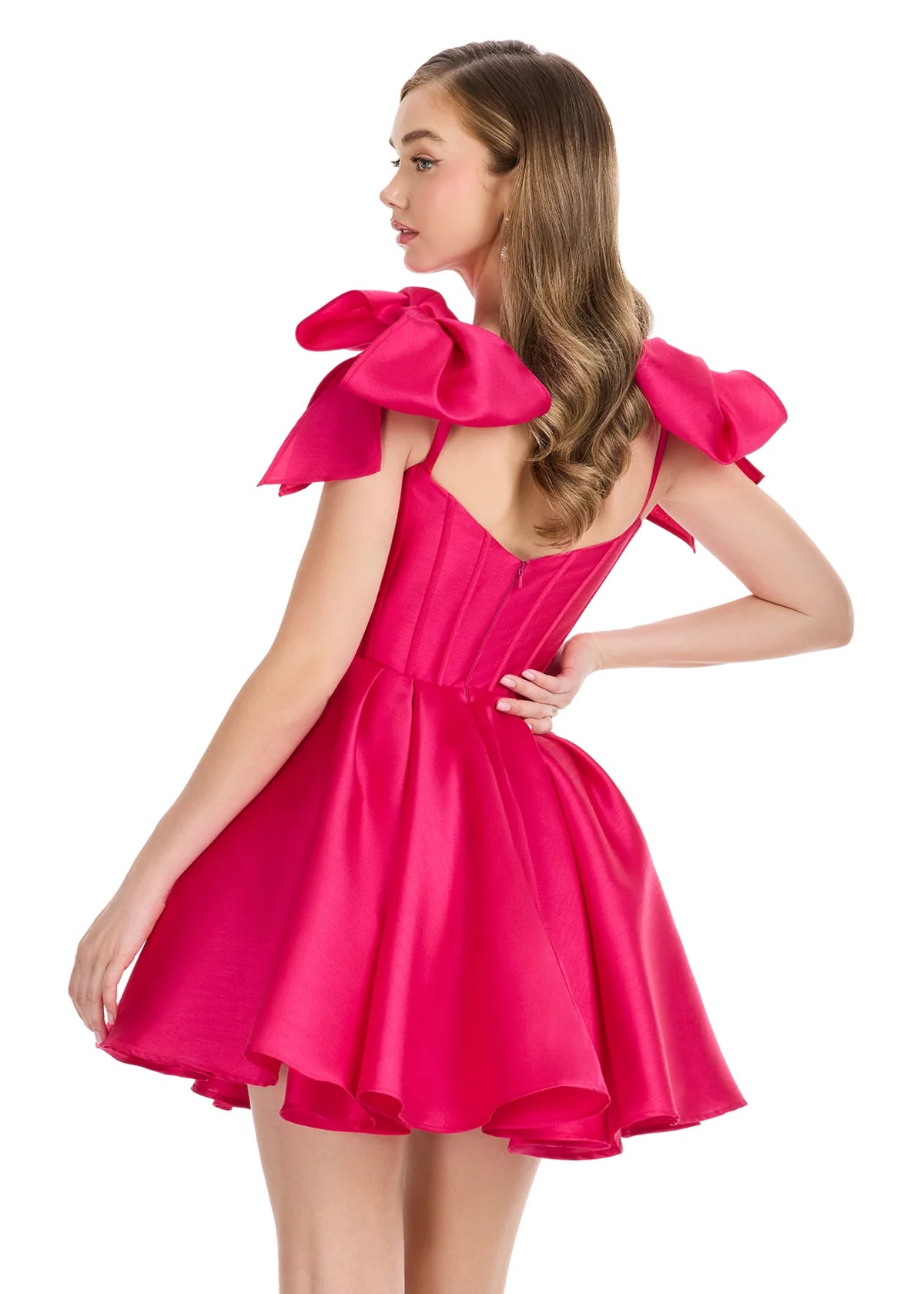 Galene Mini Dress | Fuchsia Glamorous mini dress with bold bow accents, structured neckline, and flowing skirt.