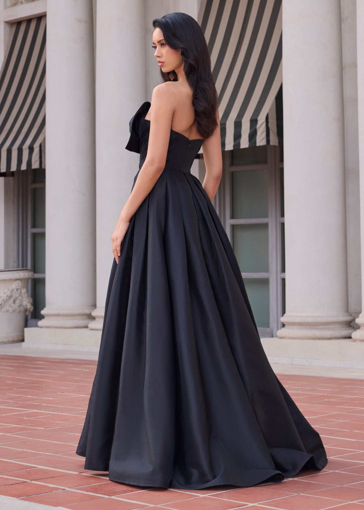 Delilah Gown | Black Mikado Strapless Evening Gown with Asymmetrical Oversized Bow, Structured Silhouette and Elegant Formal Volume for Galas, Weddings and Red Carpet Events Back view