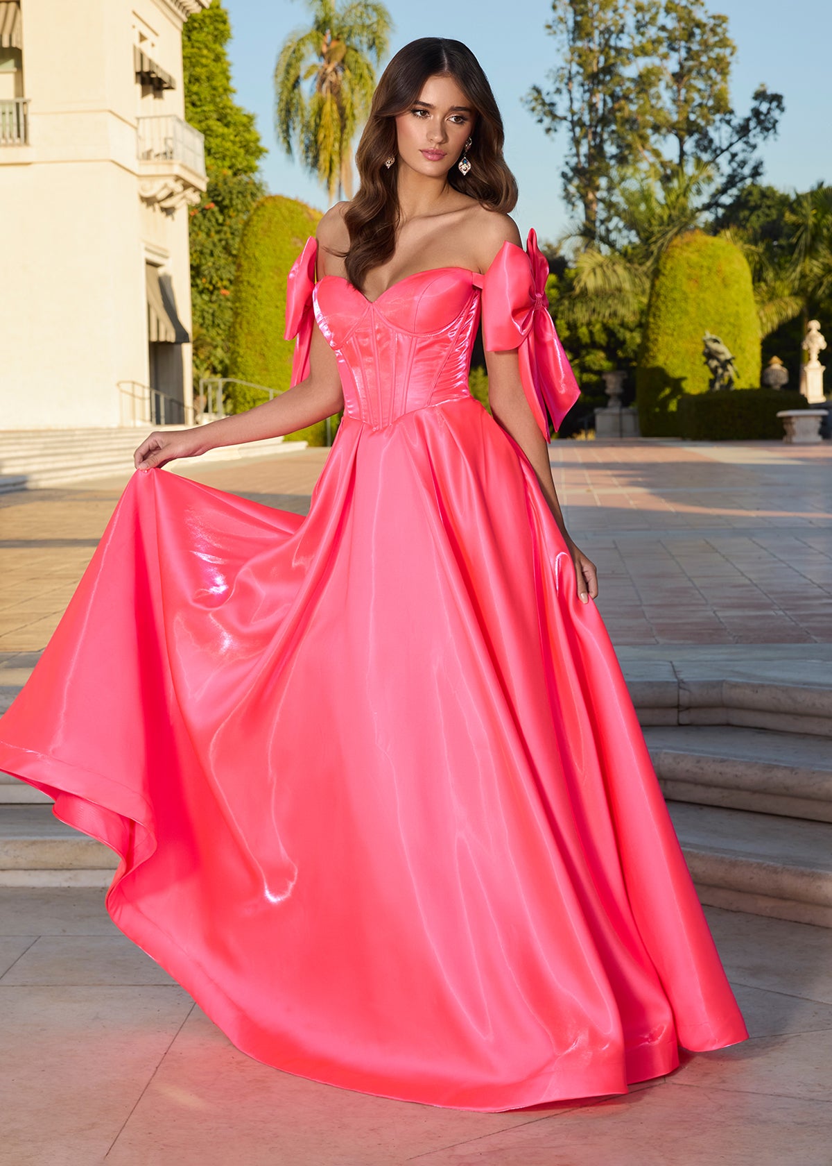 Lavinia Gown | Hot-Pink Couture-inspired ball gown with sweetheart neckline, corset fit, and statement bow sleeves.