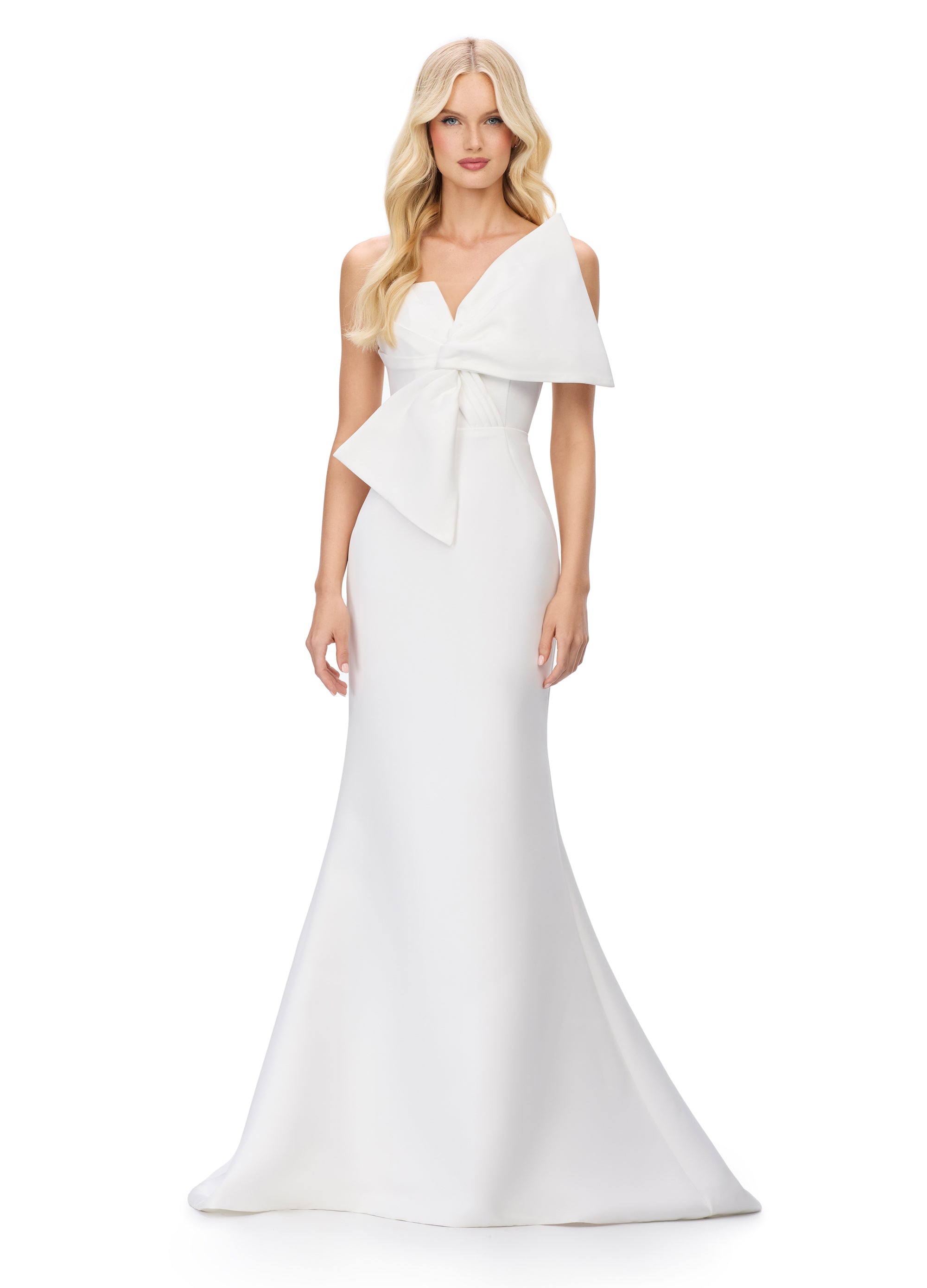 Jinnie Gown | Ivory Couture-inspired gown with oversized bow feature and sculpted mermaid silhouette for statement bridal or evening looks.