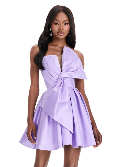 Lydia Mini Dress | Orchid Statement mini dress with oversized bow, fitted bodice, and pleated short skirt.