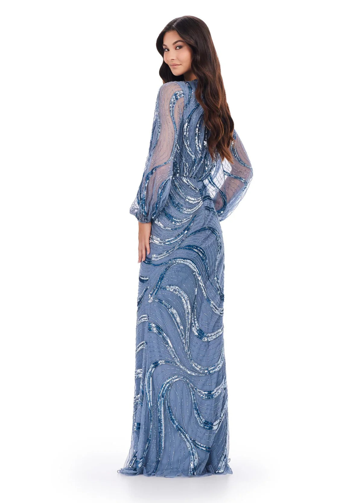 Back view - Exquisite floor-length gown featuring a plunging neckline, long sheer sleeves, intricate sequin patterns, and a fitted silhouette for a glamorous and elegant look.