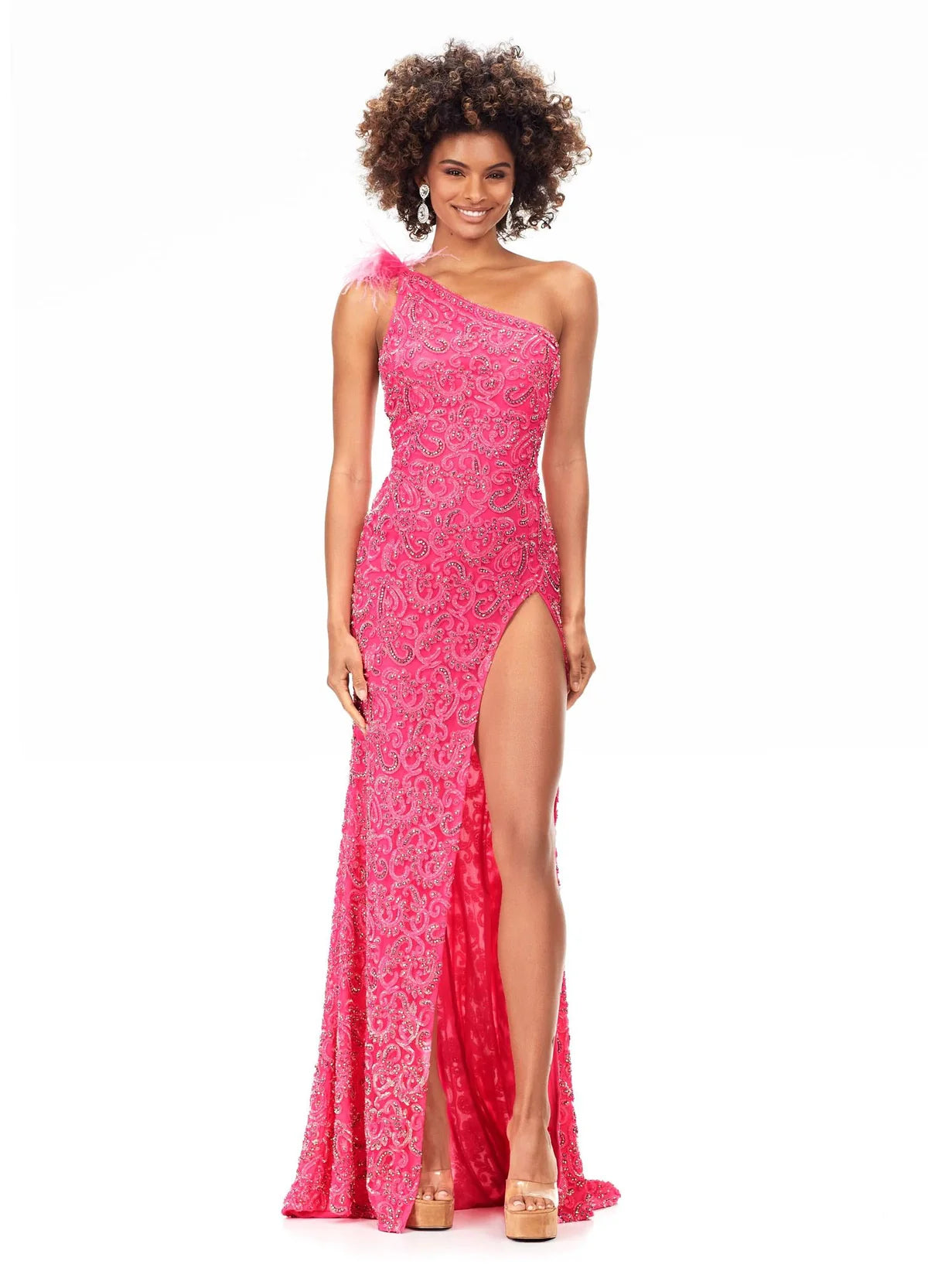 Stunning pink one-shoulder evening gown with intricate beadwork, feathered shoulder detail, and a thigh-high slit for a bold and glamorous look.