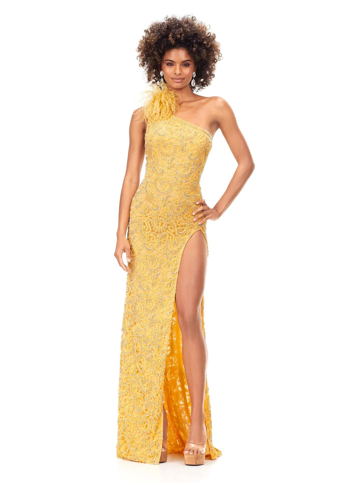 Stunning yellow one-shoulder evening gown with intricate beadwork, feathered shoulder detail, and a thigh-high slit for a bold and glamorous look.