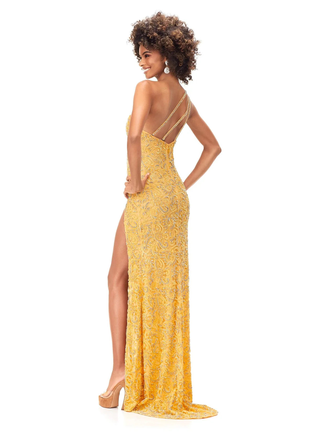 Back view - Stunning yellow one-shoulder evening gown with intricate beadwork, feathered shoulder detail, and a thigh-high slit for a bold and glamorous look.