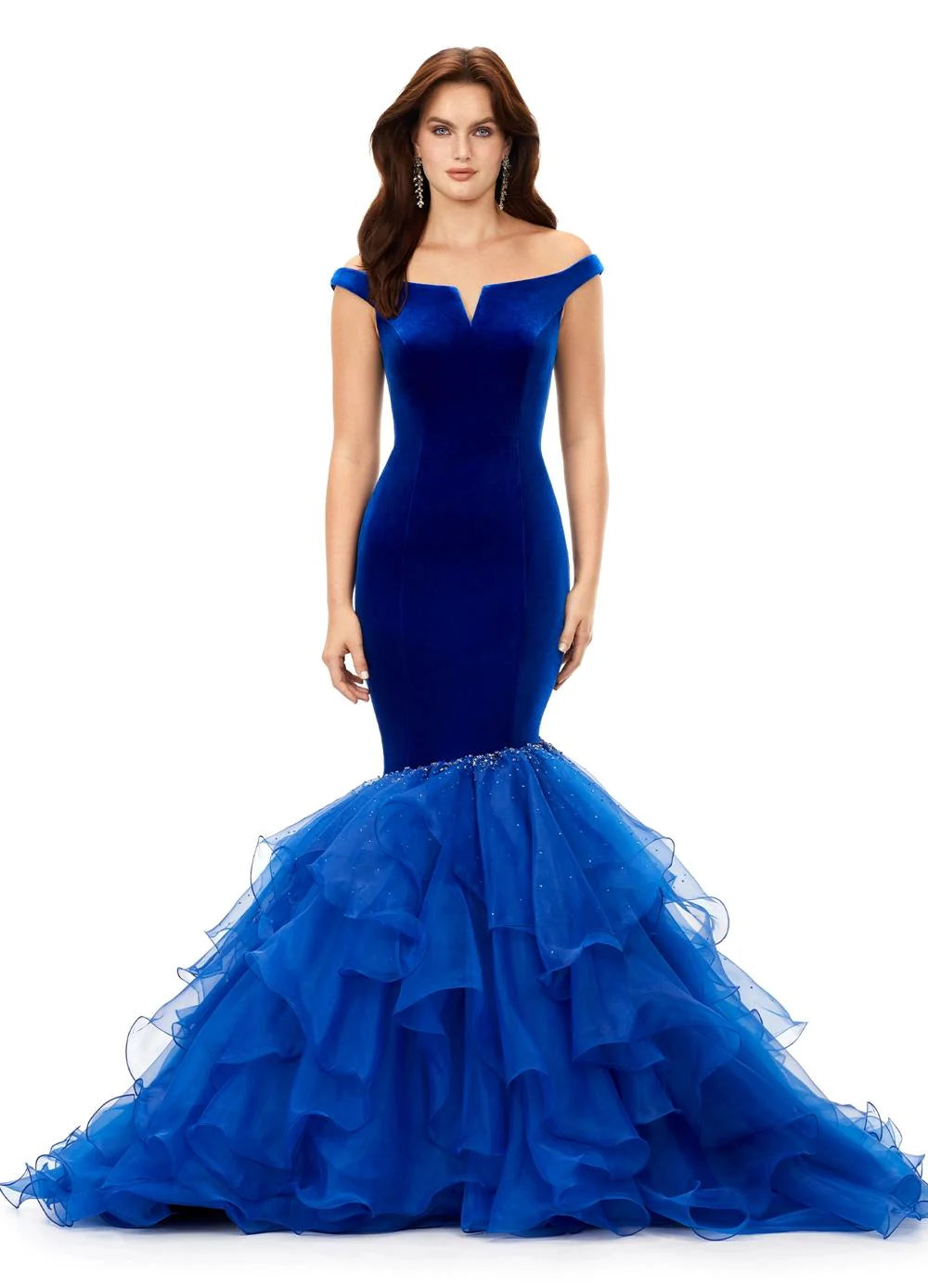 A stunning  royal blue off-the-shoulder mermaid gown crafted from luxurious velvet, featuring a plunging sweetheart neckline and transitioning into a voluminous organza skirt adorned with shimmering embellishments for an elegant contrast.