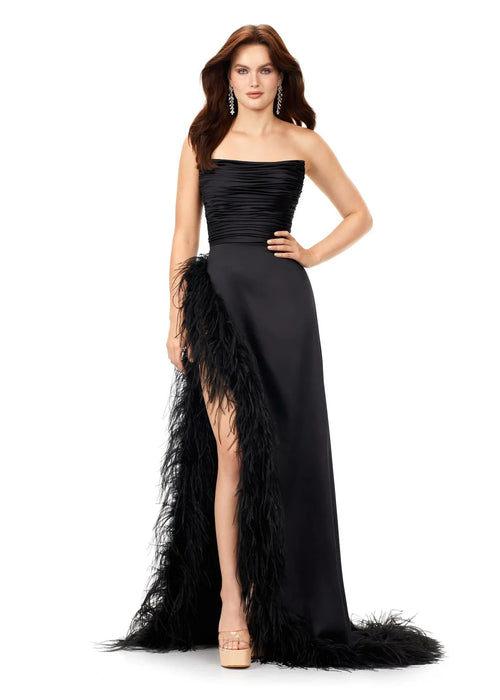 Carina Gown | Black satin evening gown with ruched bodice, A line skirt and high leg slit trimmed in feathers, combining sophistication with daring glamour, perfect for galas, evening affairs or any event where you want to shine