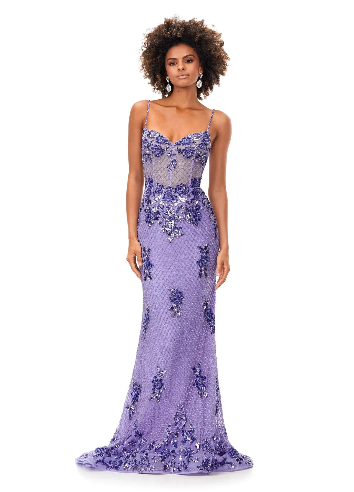Lilac mermaid gown adorned with intricate floral appliqués and shimmering sequins, featuring a sheer bodice and delicate spaghetti straps for an ethereal and elegant look.