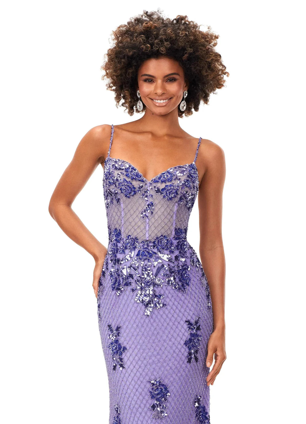 Close up - Lilac mermaid gown adorned with intricate floral appliqués and shimmering sequins, featuring a sheer bodice and delicate spaghetti straps for an ethereal and elegant look.