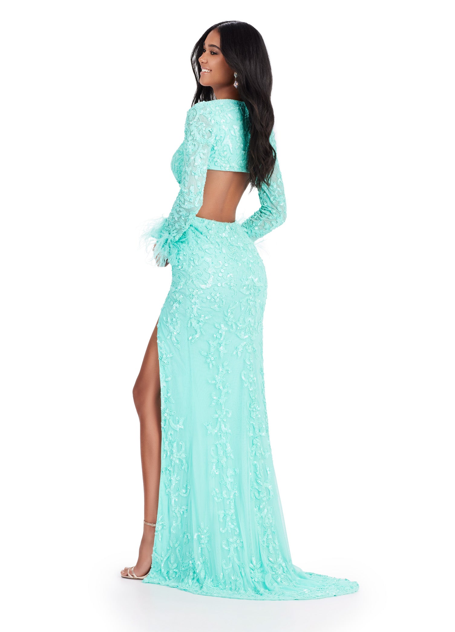 Back view - Aqua gown featuring intricate embroidery, long sheer sleeves, feathered cuffs, a daring cutout waistline, and a high slit for a chic and elegant look.