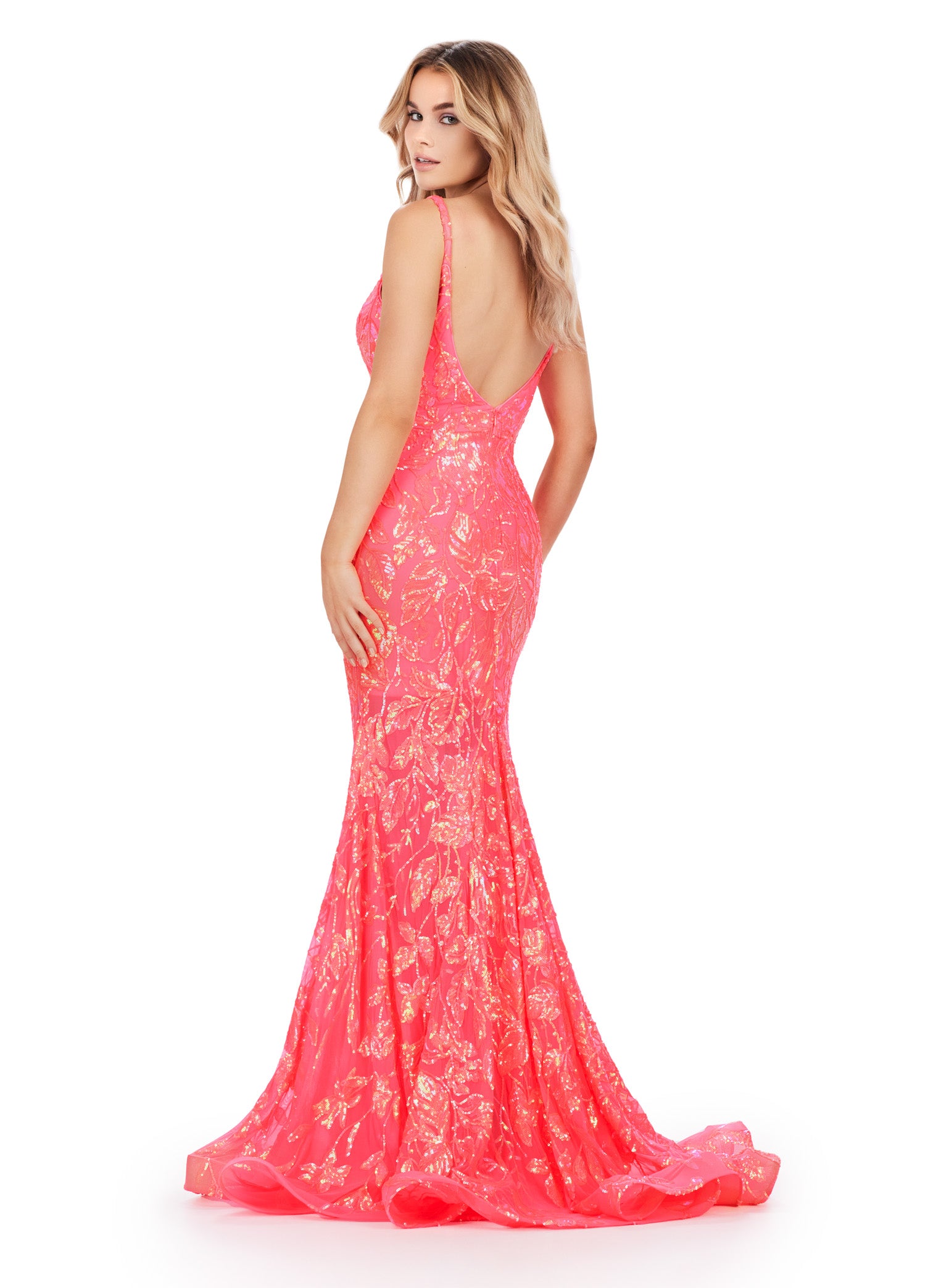 ASHLEYlauren_11444 Coral evening gown adorned with shimmering sequin detailing and a plunging V-neckline, featuring a fitted silhouette that flares into a mermaid-style skirt.