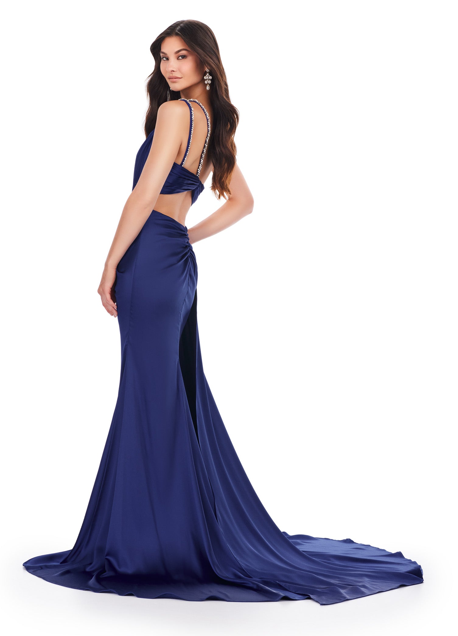Back view - Elegant navy floor-length gown featuring a one-shoulder design, draped bodice with sparkling embellishments, a thigh-high slit, and a flowing train for a sophisticated and glamorous look.