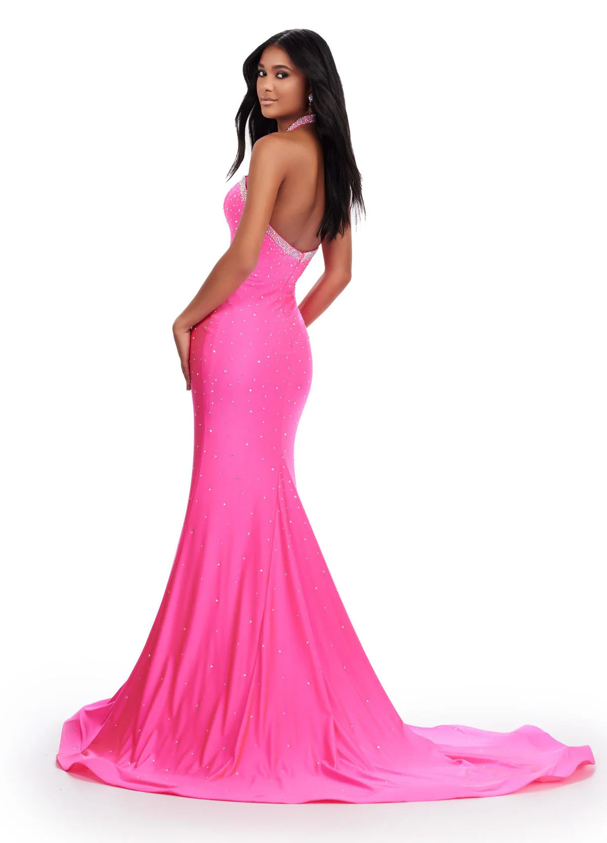Back view of an elegant hot pink gown with a halter neckline, diamond-shaped cut-outs, and shimmering embellishments for a bold and glamorous statement.
