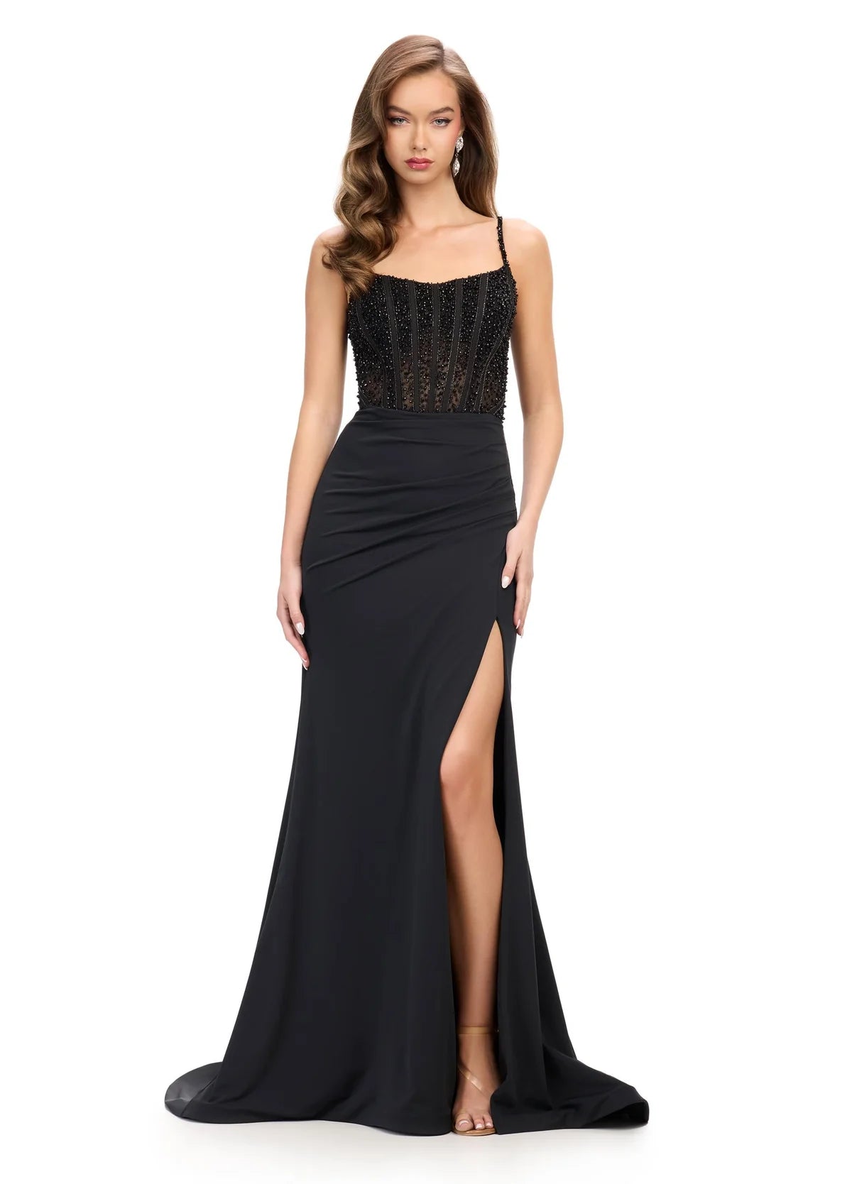 Black Evening Gown Featuring A Beaded Corset Bodice, Draped Skirt, Spaghetti Straps, And High Side Slit.