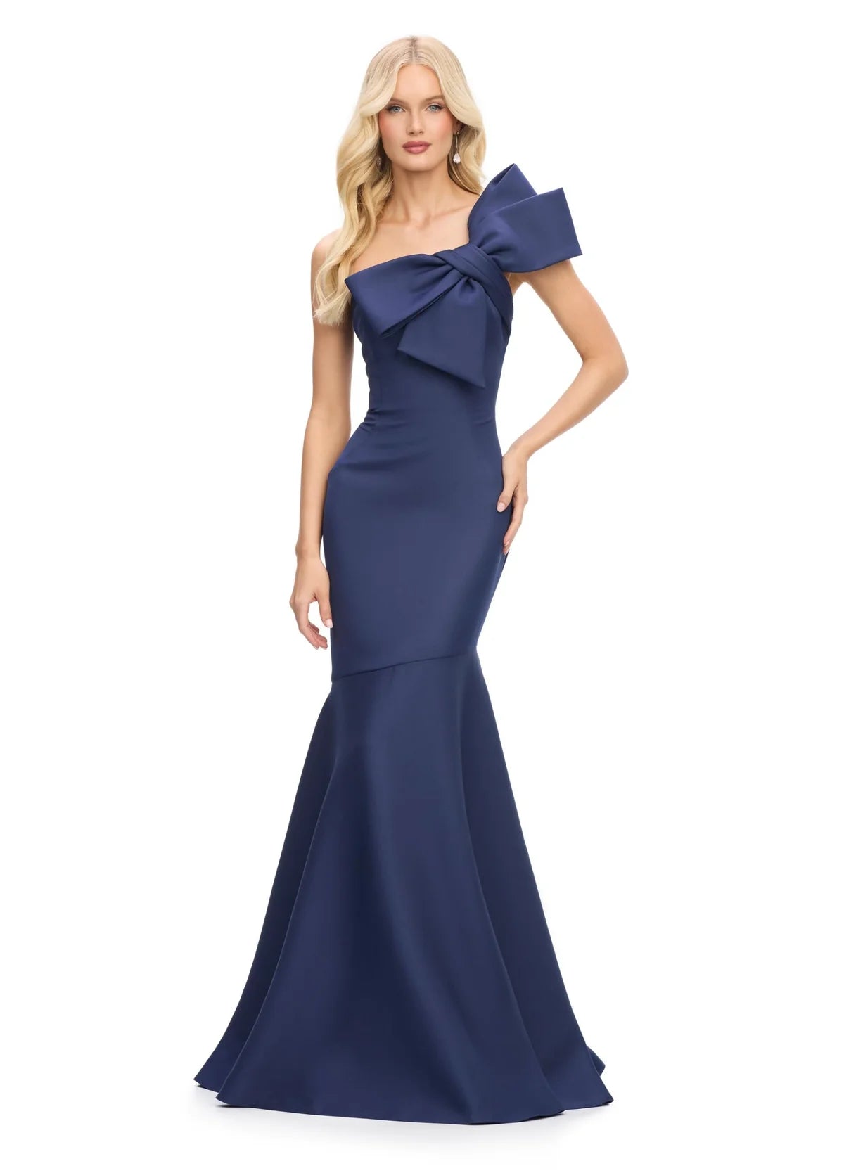 Navy elegant mermaid gown featuring a dramatic oversized bow at the shoulder, creating a stunning blend of modern sophistication and timeless charm.
