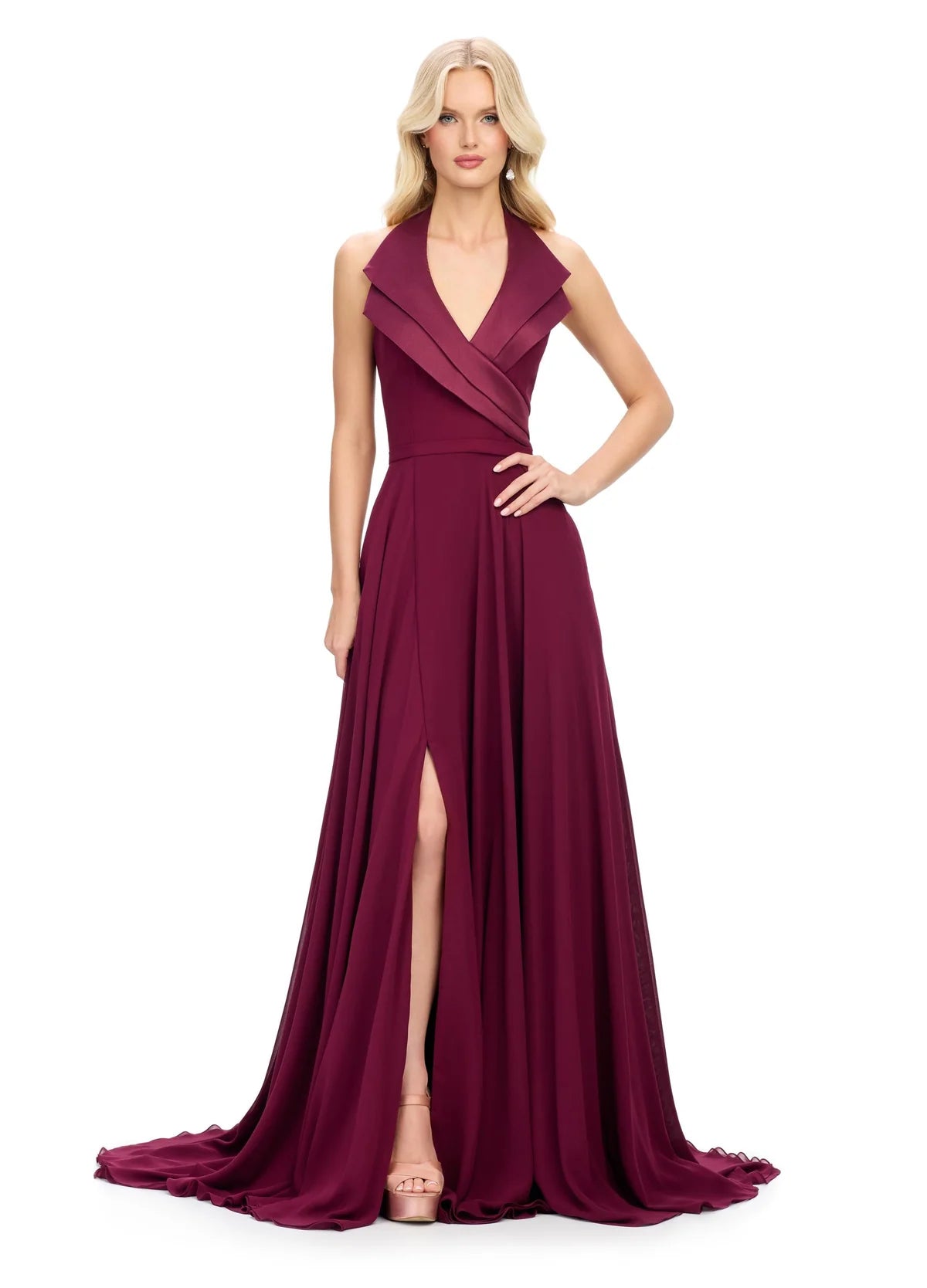 Wine halter-neck evening gown featuring a deep V-neckline with structured lapel detailing, a fitted waist, and a flowing floor-length skirt with a high slit.