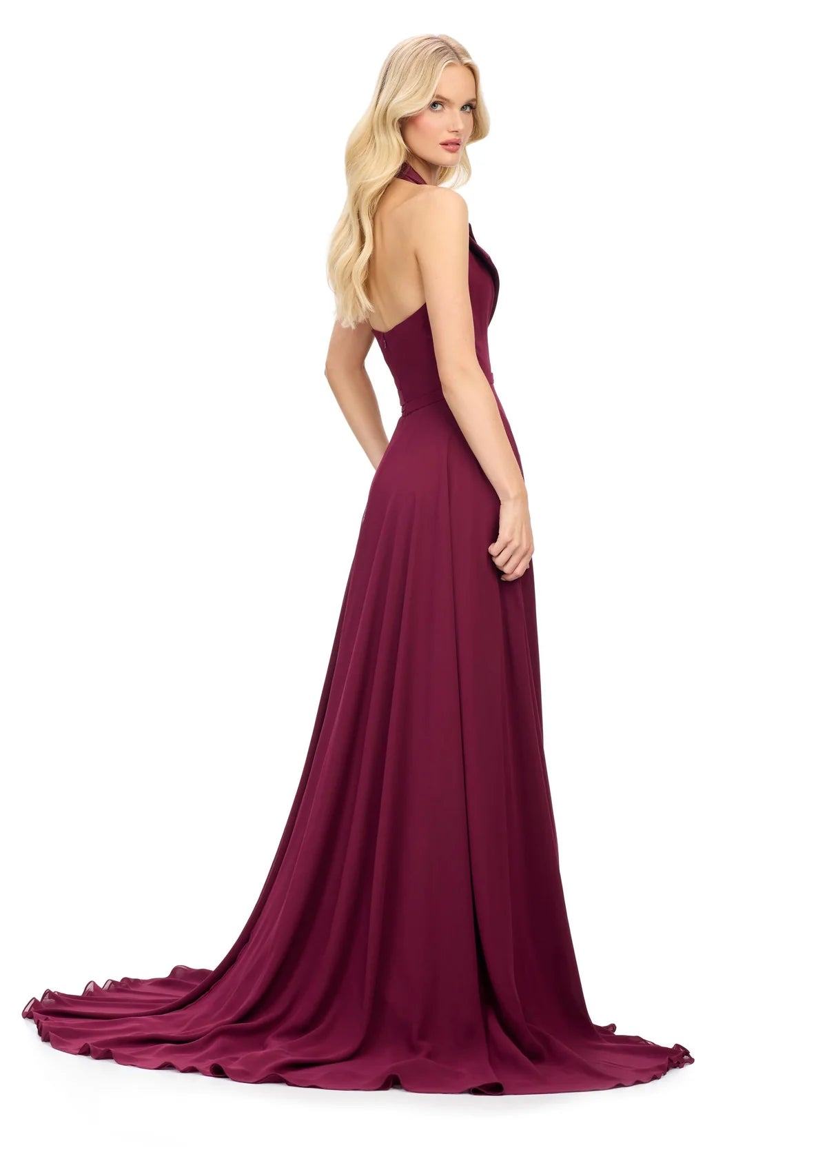 Back View - Burgundy halter-neck evening gown featuring a deep V-neckline with structured lapel detailing, a fitted waist, and a flowing floor-length skirt with a high slit.