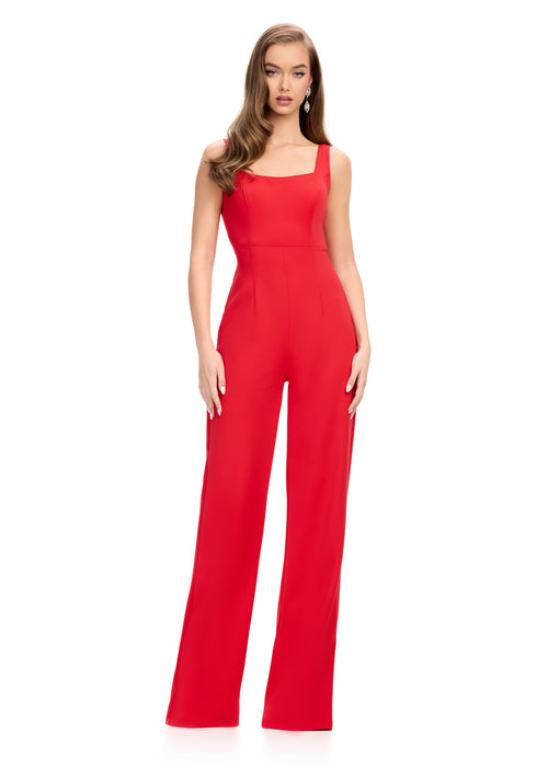 Bridie Jumpsuit | Red sleek scuba jumpsuit with spaghetti straps and removable ruffled jacket, offering a versatile look that transitions effortlessly from day to night with elegance and style