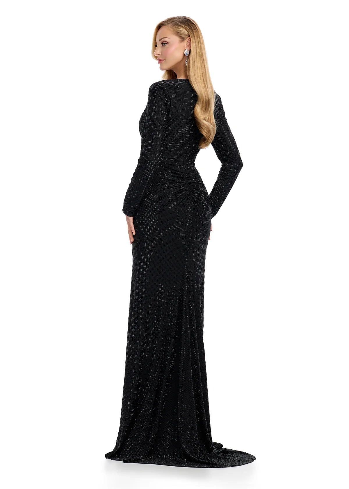 Back view - Black long-sleeve evening gown featuring a plunging V-neckline, ruched detailing at the waist, and a floor-length silhouette with subtle shimmering accents for timeless elegance.
