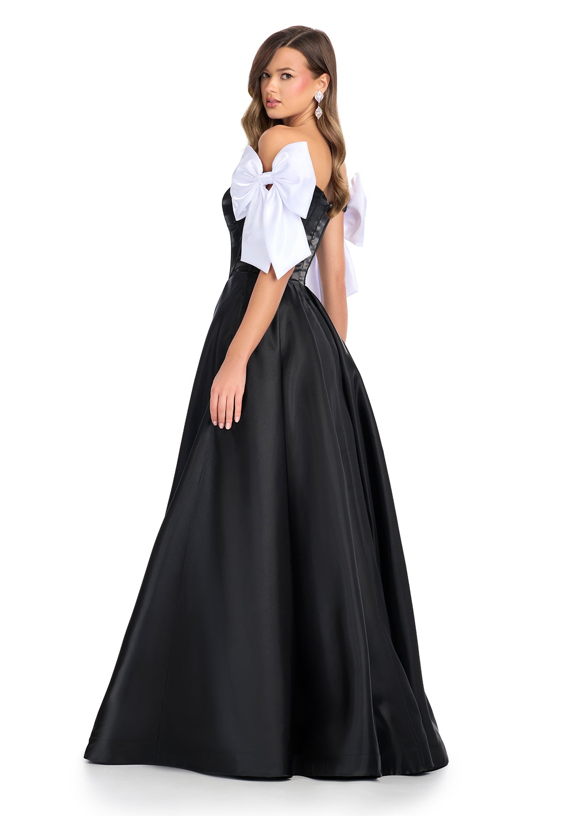 Back View - Black satin ball gown with a structured corset bodice, sweetheart neckline, and white bow-accented off-shoulder sleeves.