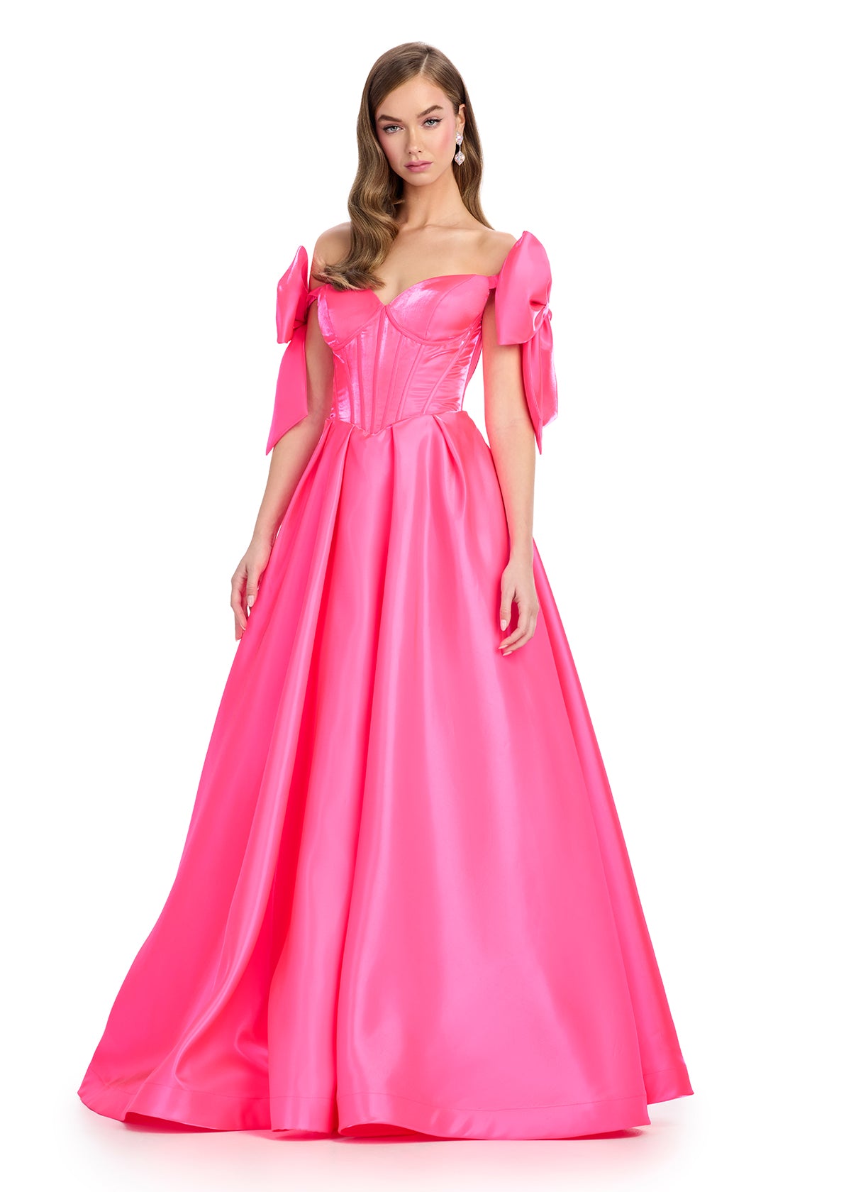 Pink satin ball gown with a structured corset bodice, sweetheart neckline, and white bow-accented off-shoulder sleeves.