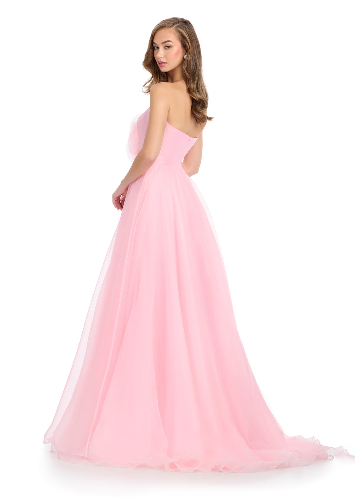 Back View - Strapless light pink gown with a large rose detail on the bodice and a flowing A-line silhouette.
