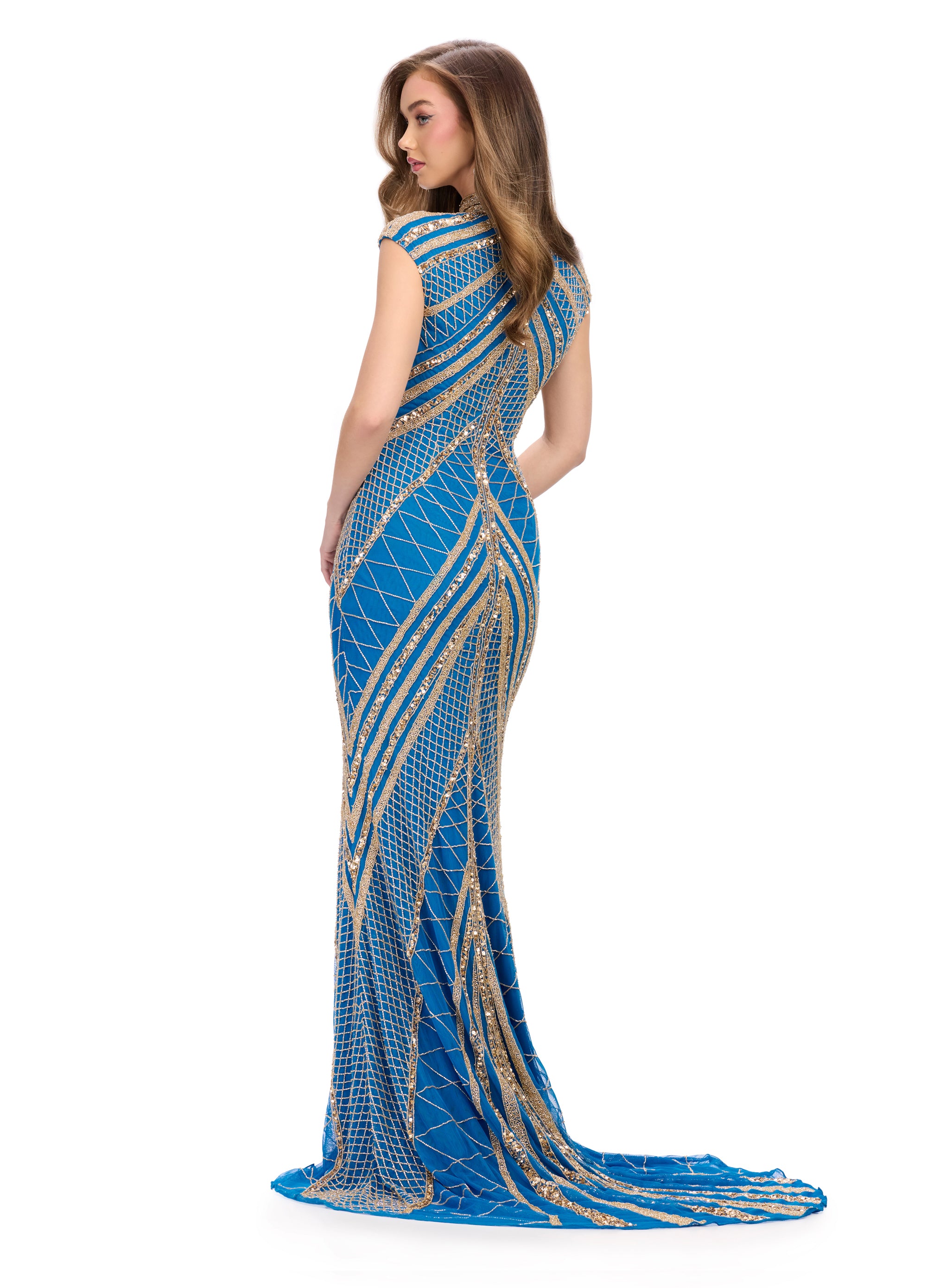 Back view - Aqua and gold geometric gown with intricate beadwork, a high neckline, and cap sleeves, designed with a dramatic front slit for a striking and elegant look.