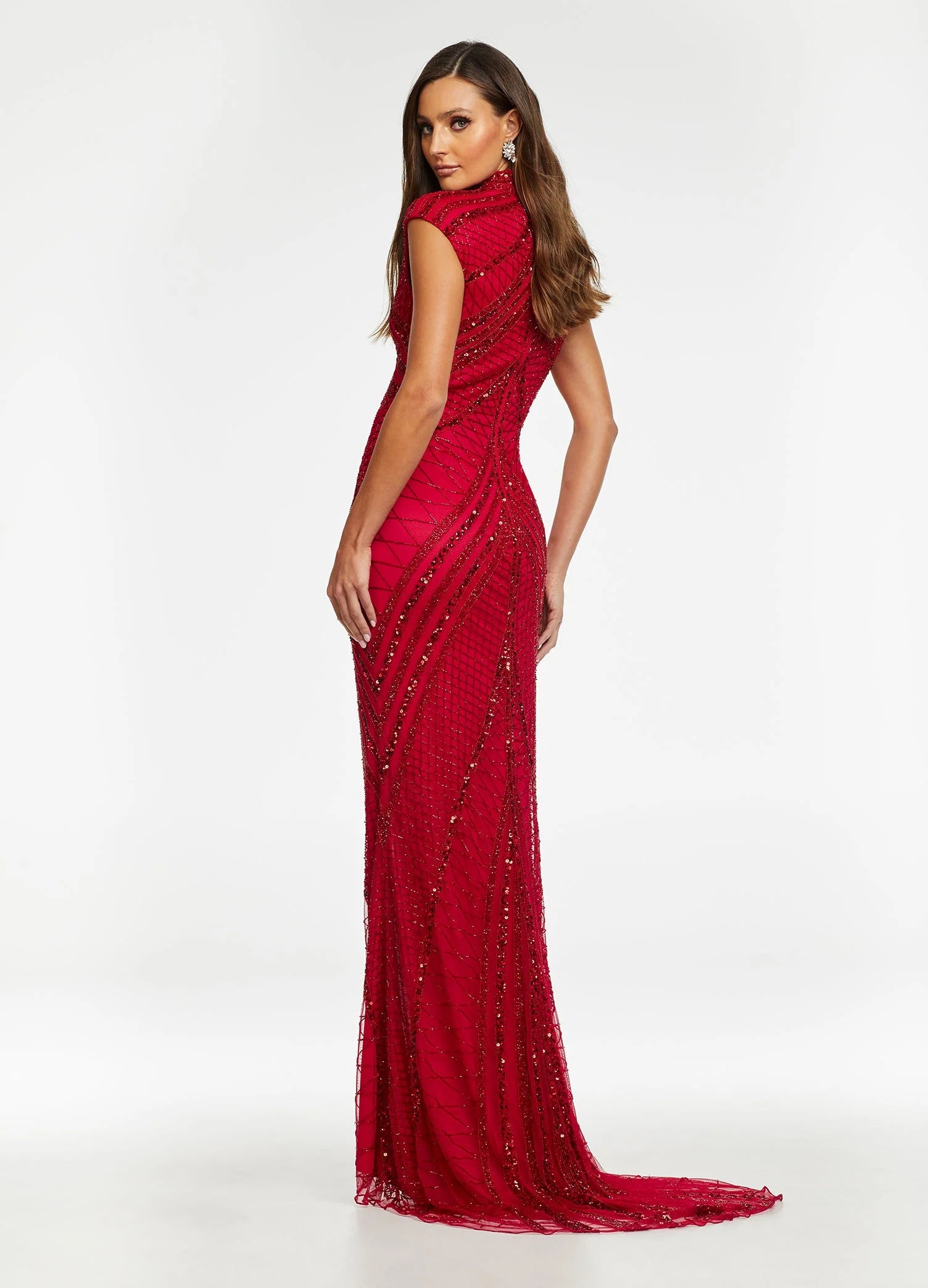 Back view - Red beaded gown with a high neckline and cap sleeves, featuring intricate embellishments that create a captivating geometric design, paired with a front slit for a modern touch of elegance.