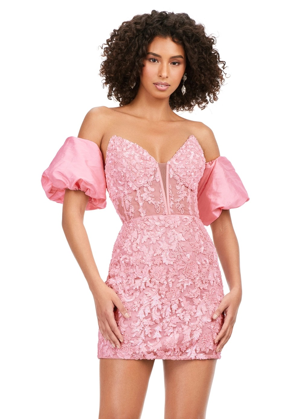 Pink sequin mini dress with floral detailing, panelled bodice, and puff off-shoulder sleeves.