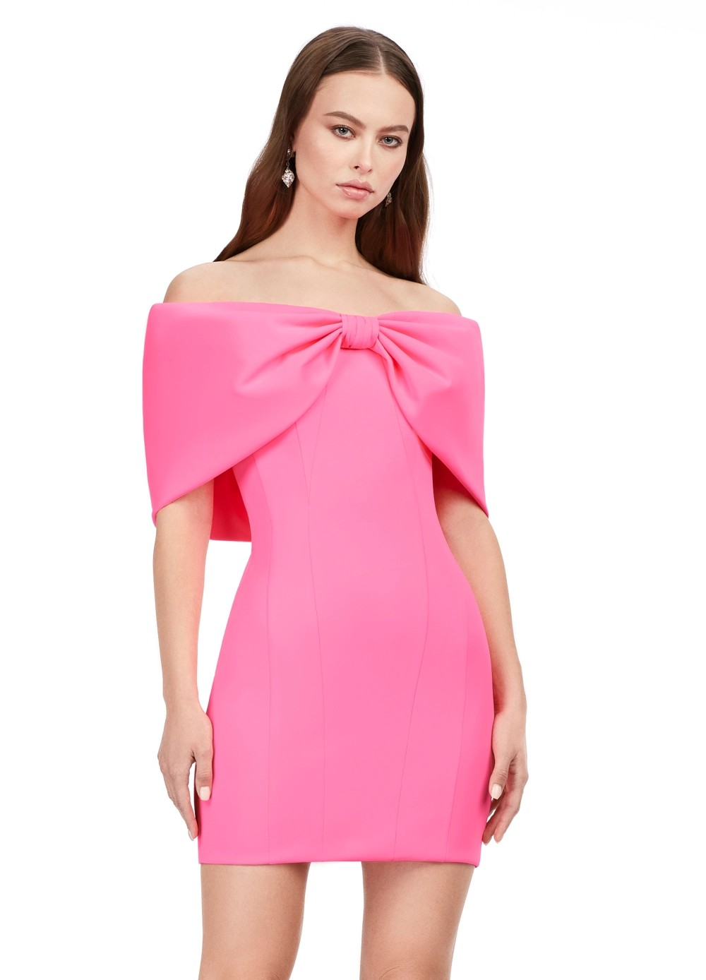 Baby pink off-the-shoulder mini dress with a bold oversized bow detail, featuring a sleek fitted silhouette for a chic and modern statement look.