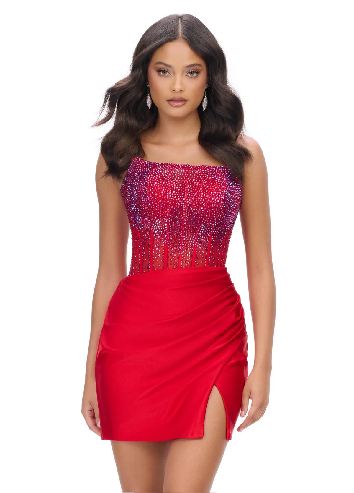 Red strapless cocktail dress with a beaded bodice and sheer detailing, paired with a draped mini skirt featuring a side slit for an elegant evening look.