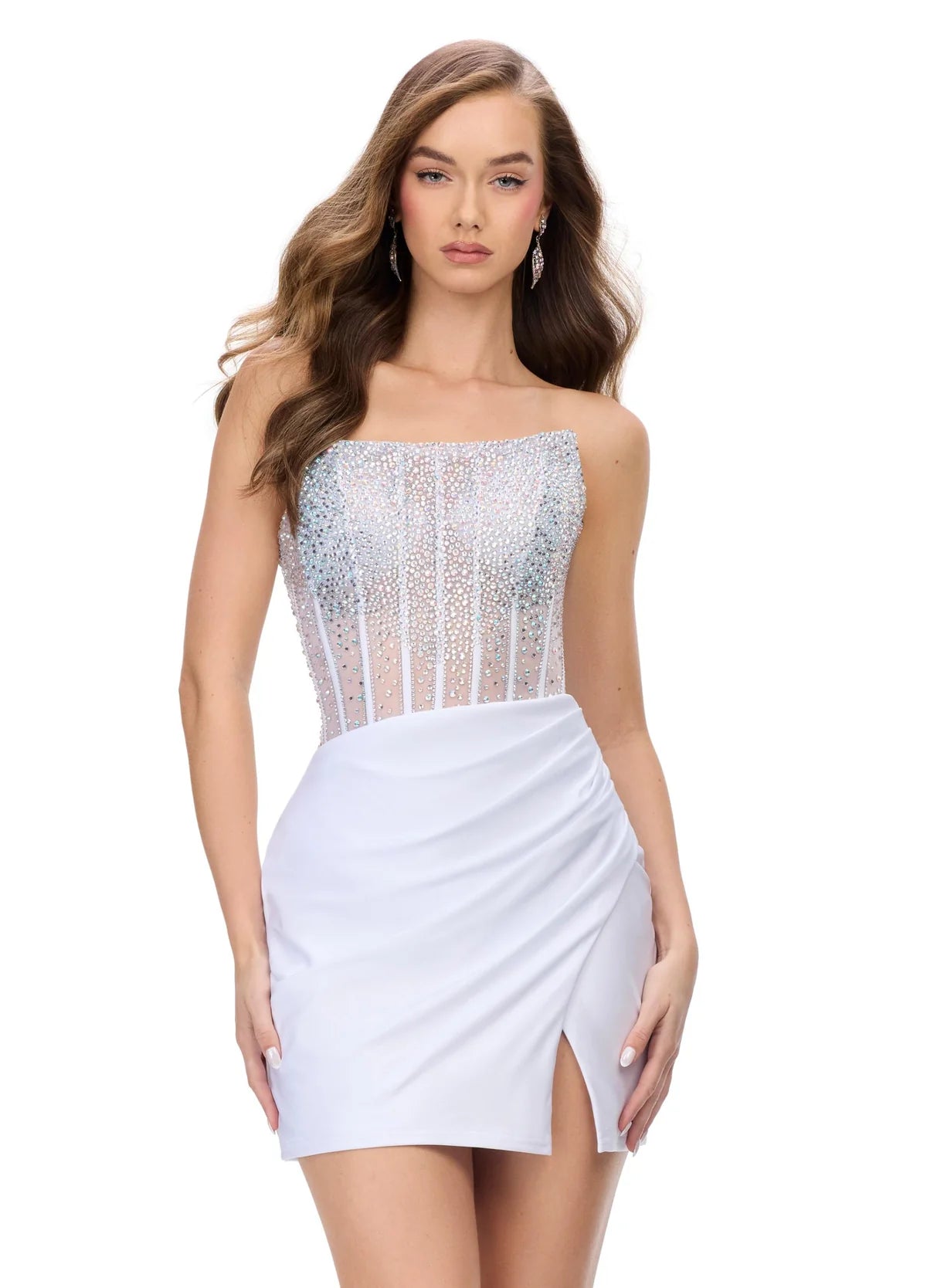 Ivory strapless cocktail dress with a beaded bodice and sheer detailing, paired with a draped mini skirt featuring a side slit for an elegant evening look.