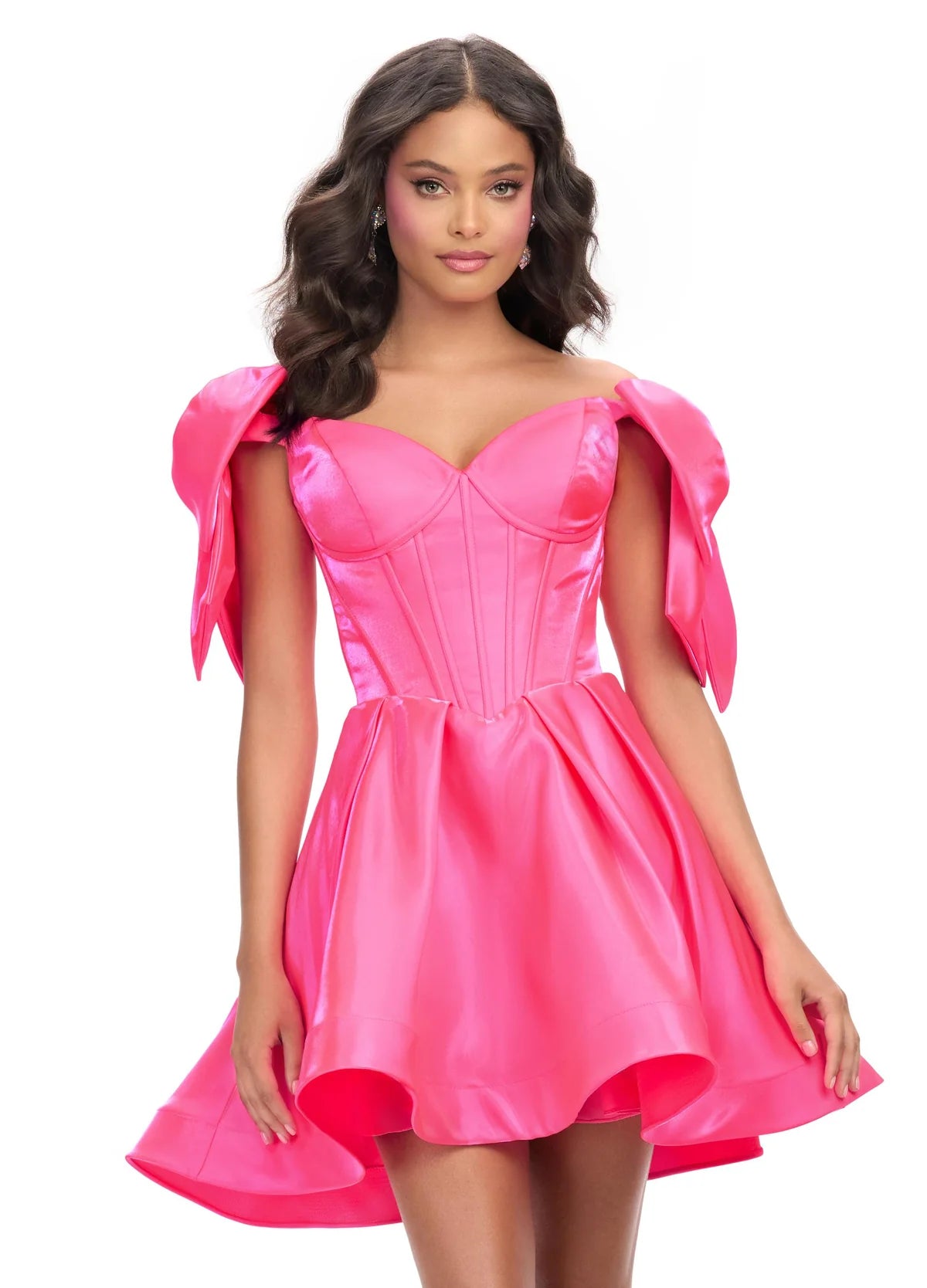 A striking pink mini dress with a structured corset bodice, voluminous skirt, and oversized bow accents on the shoulders, perfect for a bold and playful statement look.
