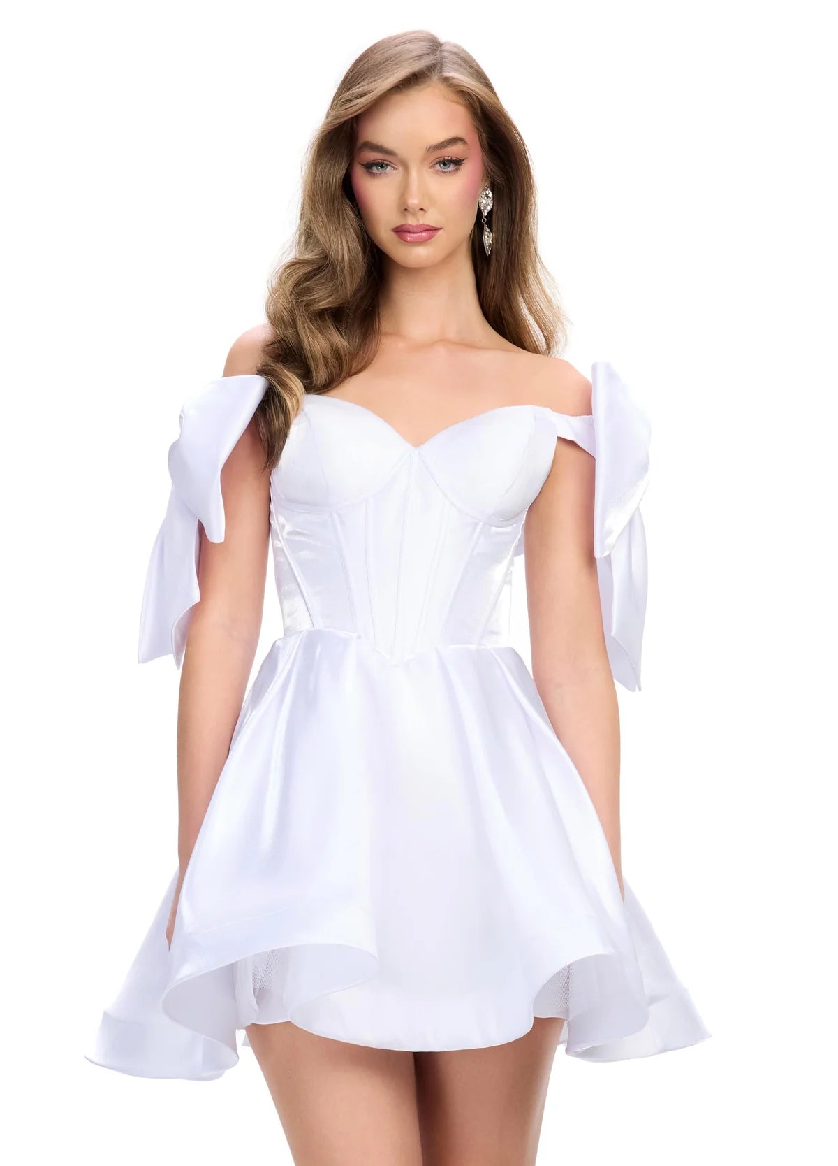 A striking white mini dress with a structured corset bodice, voluminous skirt, and oversized bow accents on the shoulders, perfect for a bold and playful statement look.