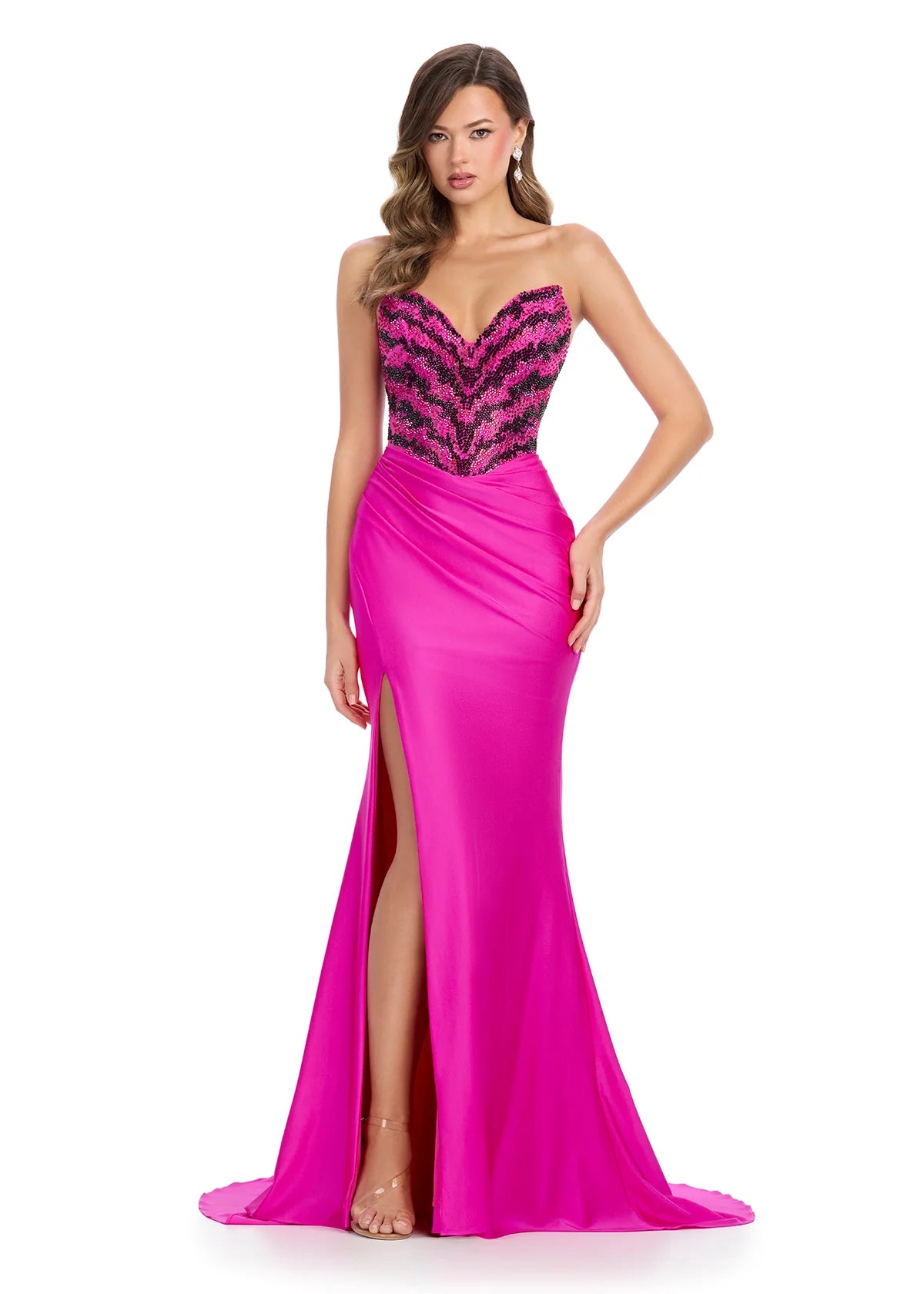 Hot Pink Strapless Evening Gown Featuring A Beaded Bodice With Chevron Detailing, Draped Skirt, High Side Slit, And Flowing Train 