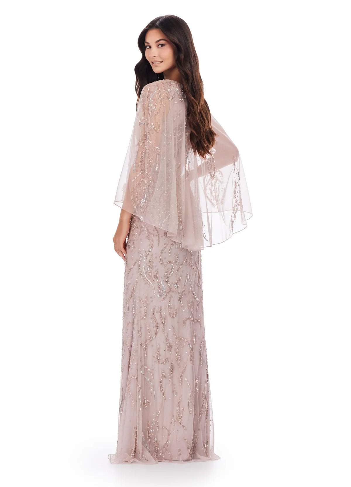 Back view - Elegant ivory evening gown with a beaded design, sheer cape-style overlay, and a floor-length silhouette for a refined and sophisticated look.