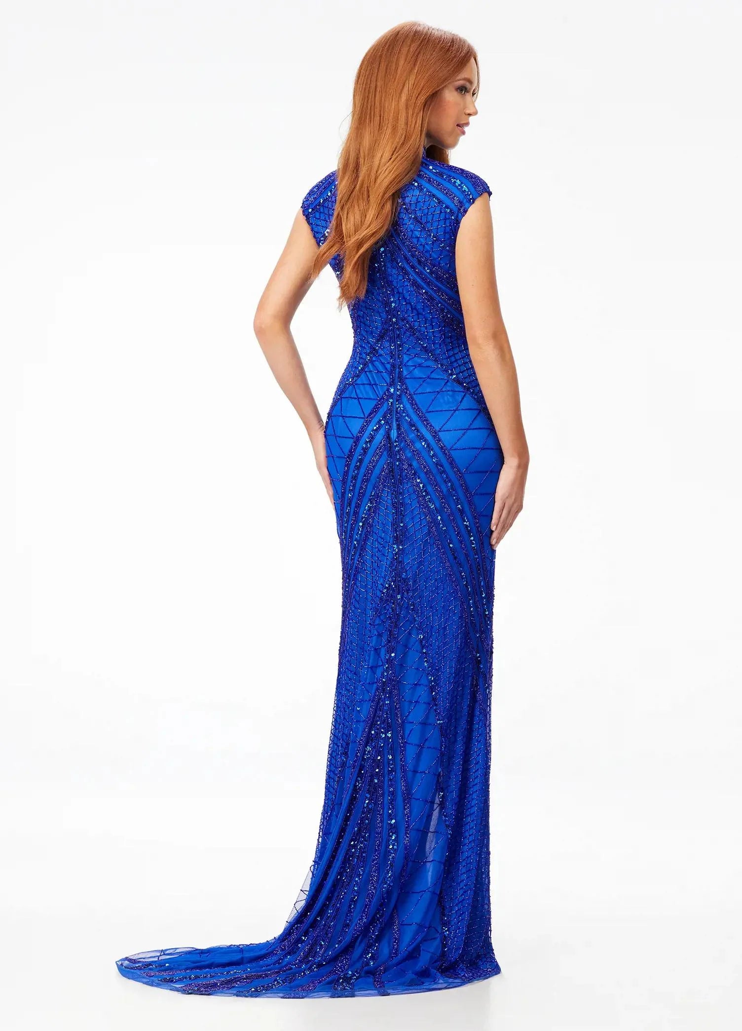 Back view - Royal blue beaded gown with a high neckline and cap sleeves, featuring intricate embellishments that create a captivating geometric design, paired with a front slit for a modern touch of elegance.
