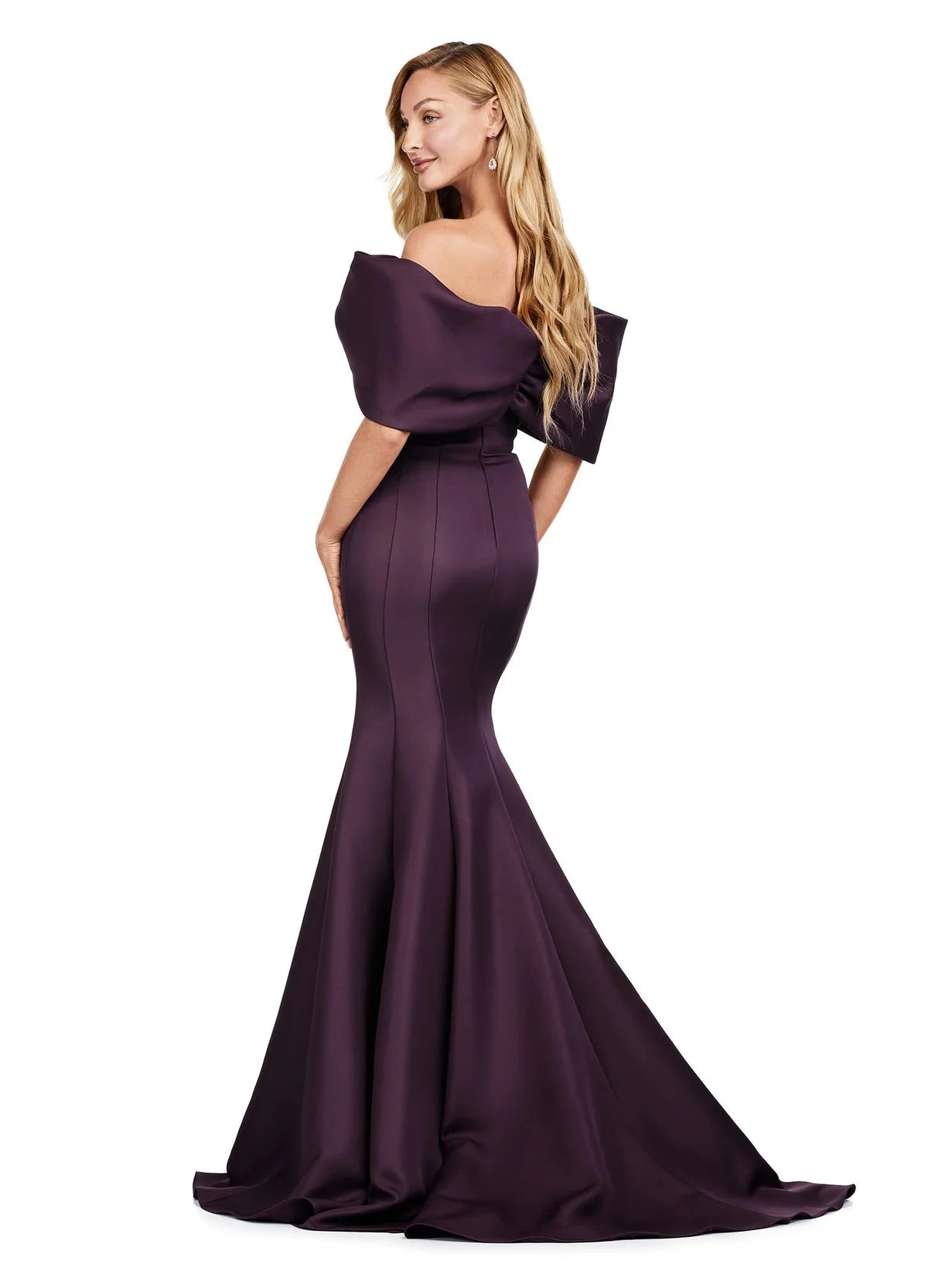 Back view -  Wine strapless mermaid gown with a dramatic oversized bow draping the shoulders, creating a timeless and sophisticated silhouette.