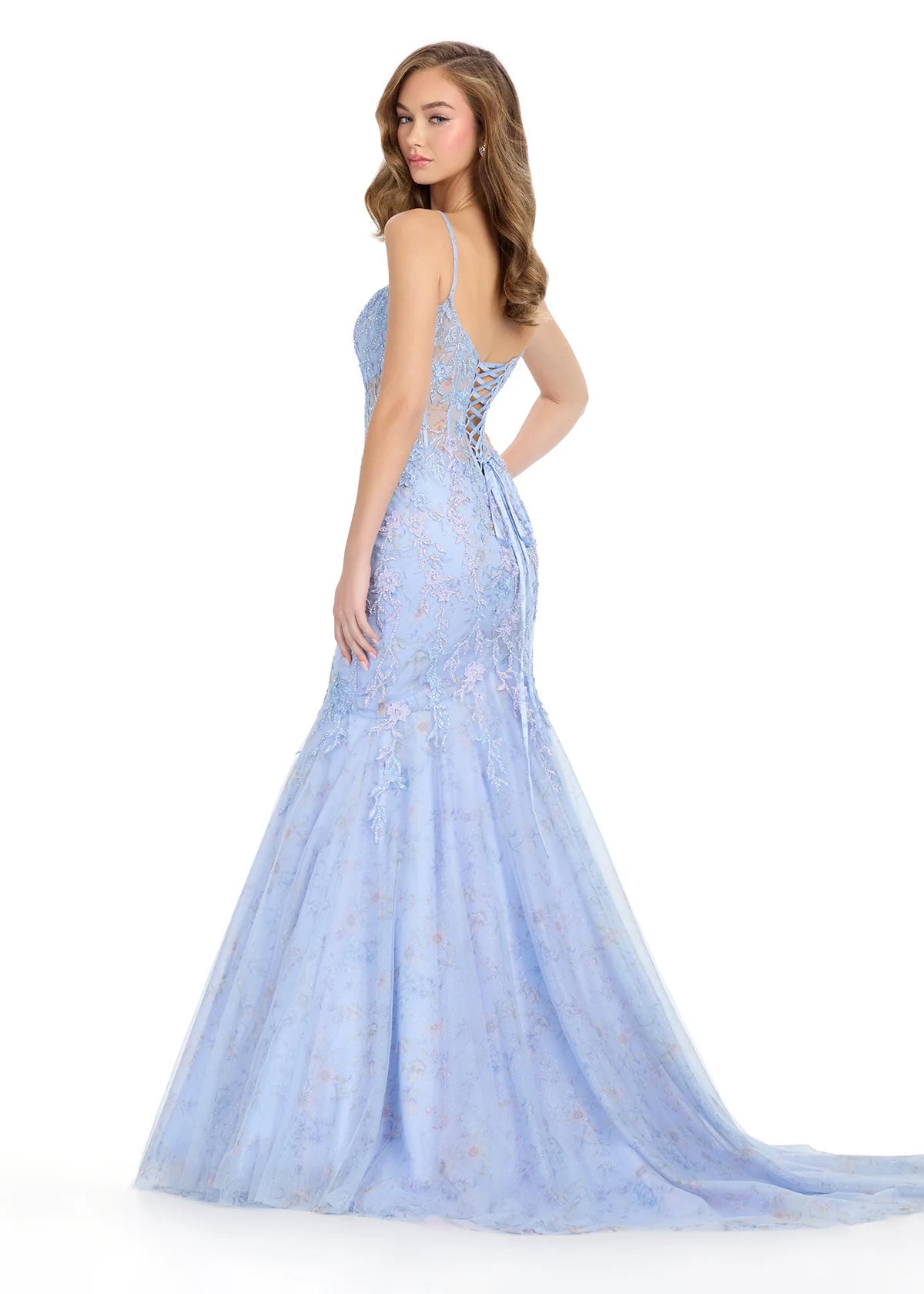Back view - Enchanting lilac mermaid gown featuring a floral lace overlay, a fitted corset bodice with delicate straps, and a dramatic flared skirt for a fairytale-inspired silhouette.