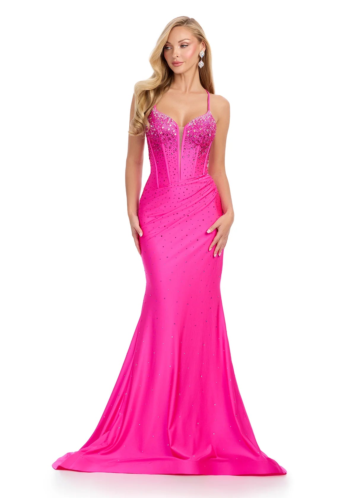 Hot pink evening gown featuring a fitted silhouette, a plunging neckline embellished with sparkling accents, and delicate straps for an elegant and glamorous look.
