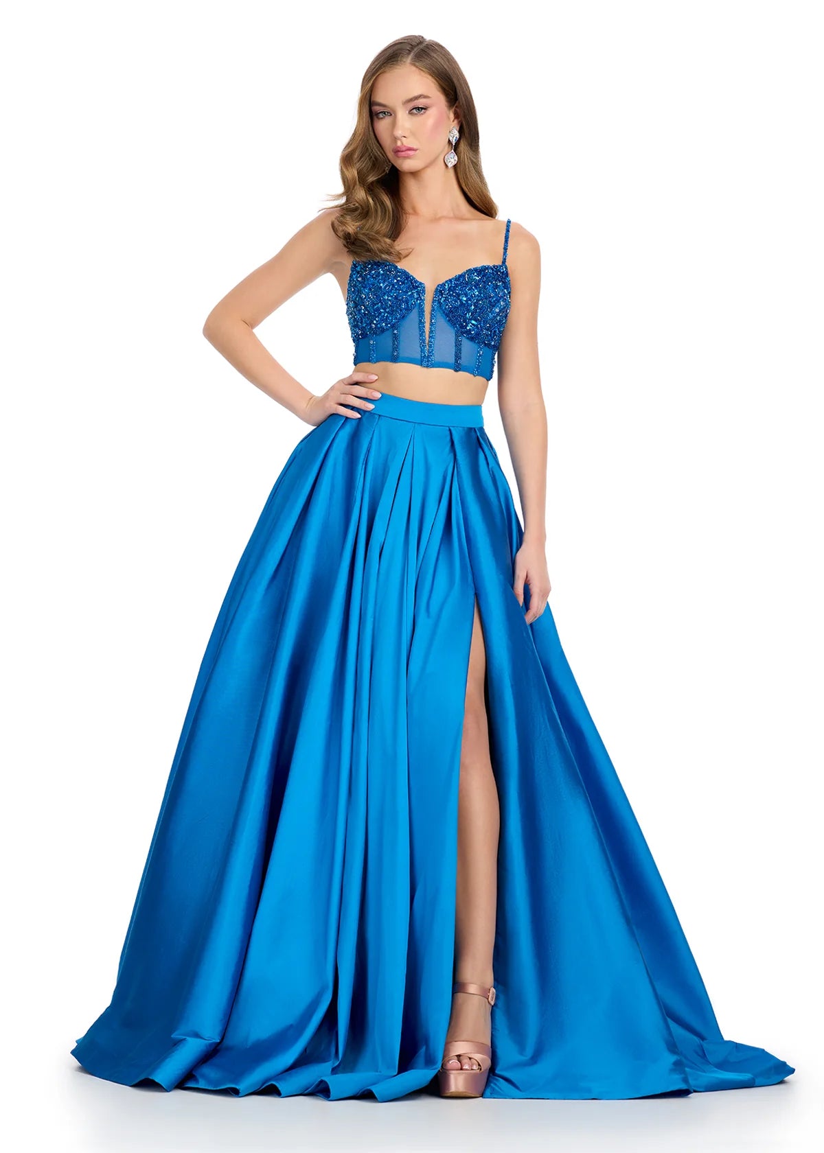 Peacock ASHLEYlauren Antalya Two Piece Gown 11826 featuring a beaded sweetheart corset with spaghetti straps, lace-up back, and voluminous high-slit taffeta skirt for a show-stopping formal look