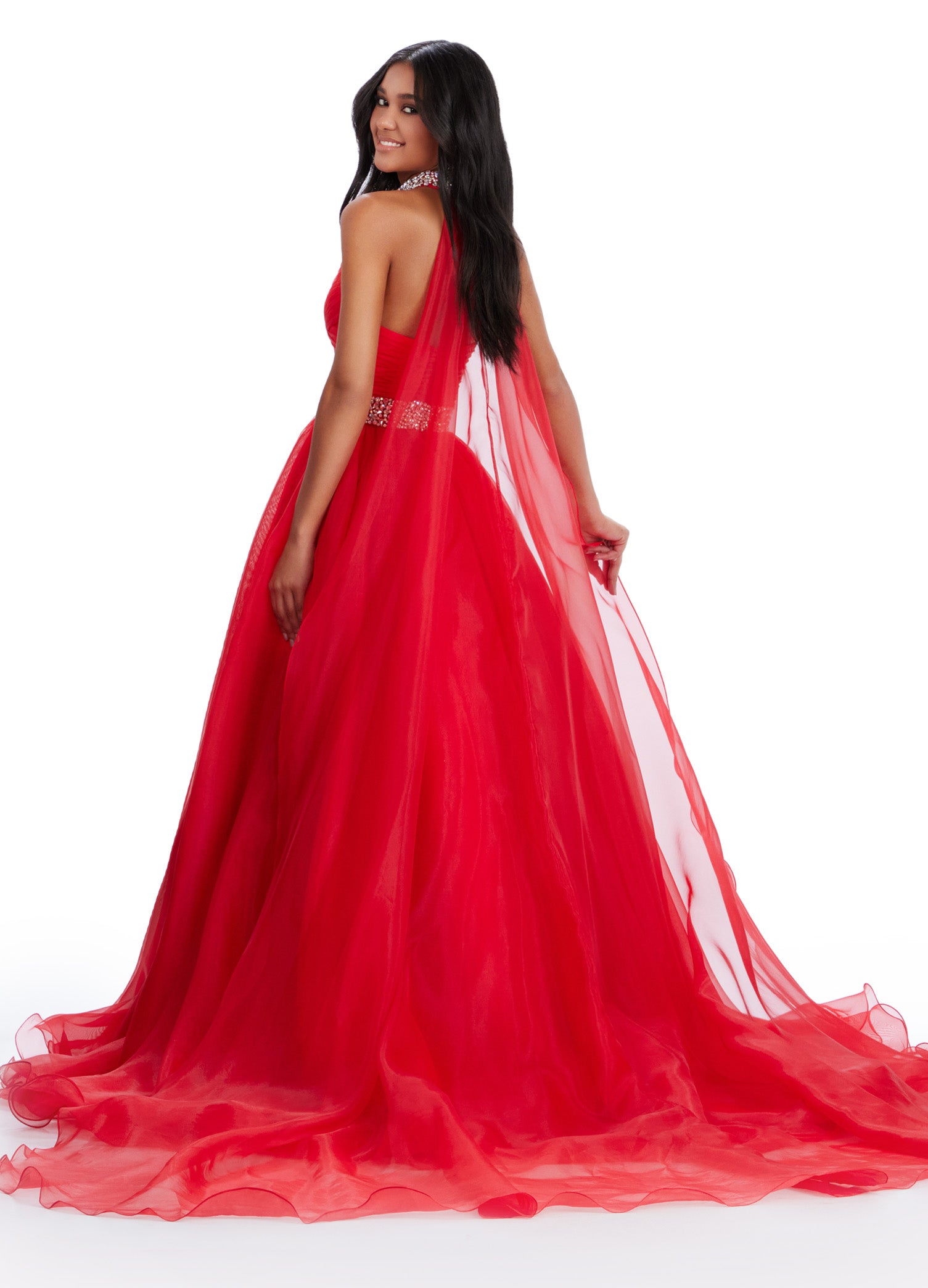 Back view - Red ball gown featuring a sweetheart neckline, ruched bodice, sparkling embellished waistband, and a flowing tulle skirt for a fairytale-inspired look.