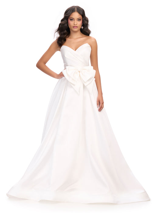 Emmelina | White Strapless white ball gown with a pleated sweetheart bodice, a statement oversized bow at the waist, and a full, floor-length skirt for a graceful, romantic silhouette.