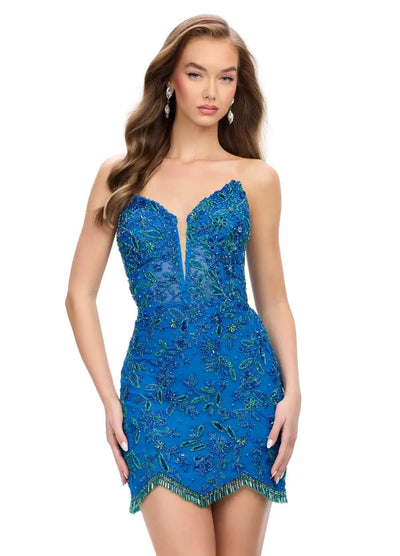 Video - Vibrant royal blue mini dress with a plunging neckline, intricate green beadwork in floral patterns, and a scalloped hem adorned with delicate fringe detailing.