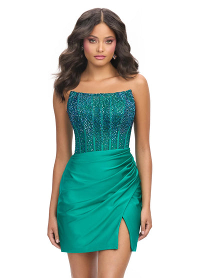 Video - Emerald strapless cocktail dress with a beaded bodice and sheer detailing, paired with a draped mini skirt featuring a side slit for an elegant evening look.