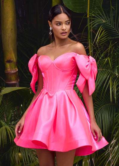 Video of a striking pink mini dress with a structured corset bodice, voluminous skirt, and oversized bow accents on the shoulders, perfect for a bold and playful statement look.