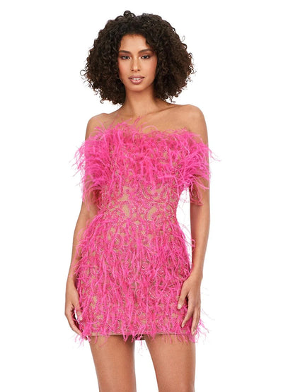 Video - Pink mini dress with intricate swirl beadwork and feather accents, offering a bold and dramatic look for a statement evening style.